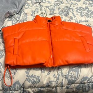 Akira orange vest